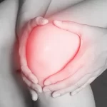lady holding her knee, joint pain. collagen peptides
