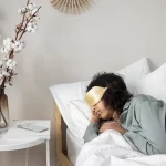Lady Sleeping with sleeping mask